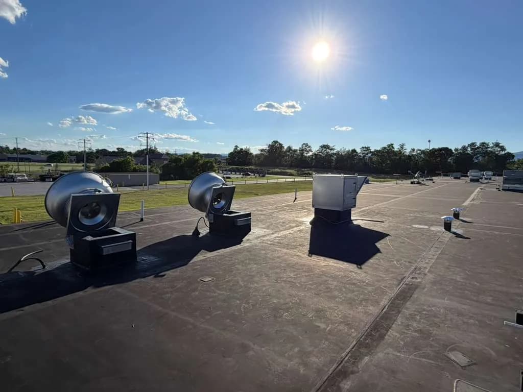 CaptiveAire rooftop exhaust fans and make-up air unit installed on Maryland commercial building
